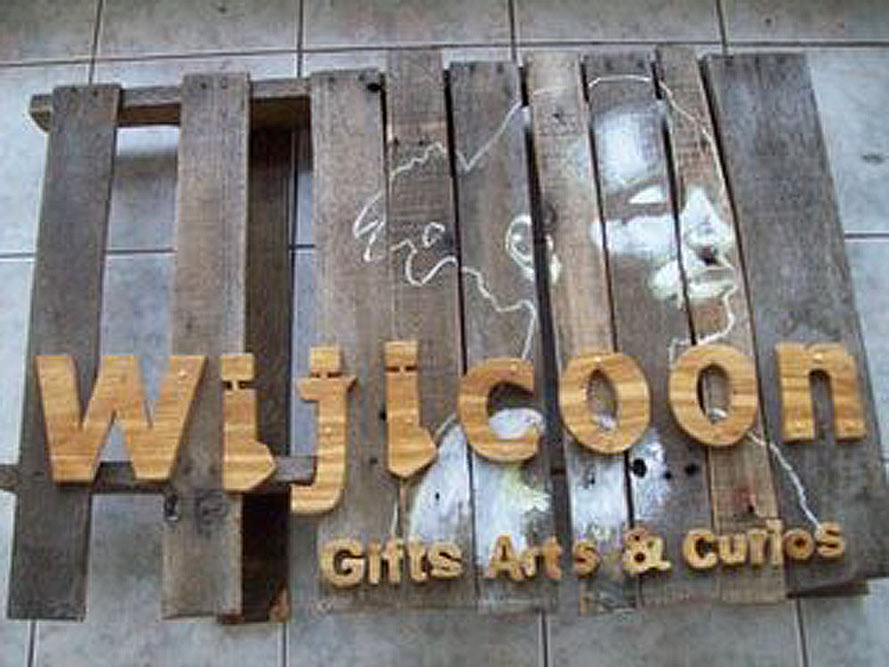 wood nails chains store sign jamaica