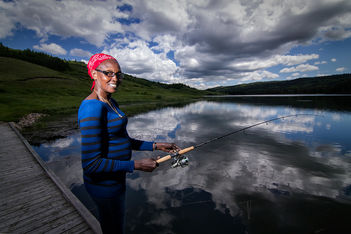immigrants Canada alberta fishing outdoors fish recreation Canadians hills lake trees Park