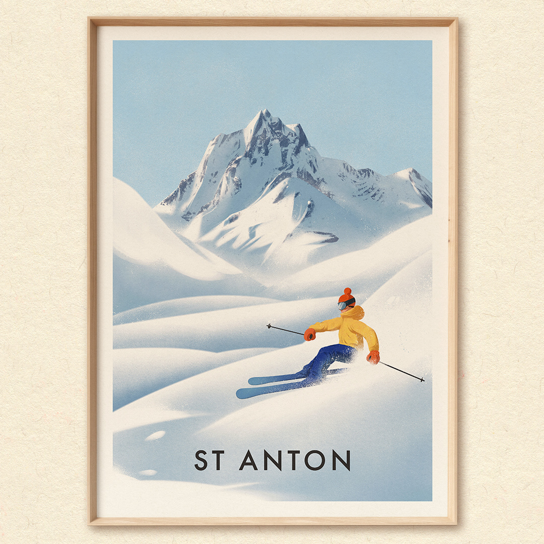 Man skiing in st anton with mountains in the background