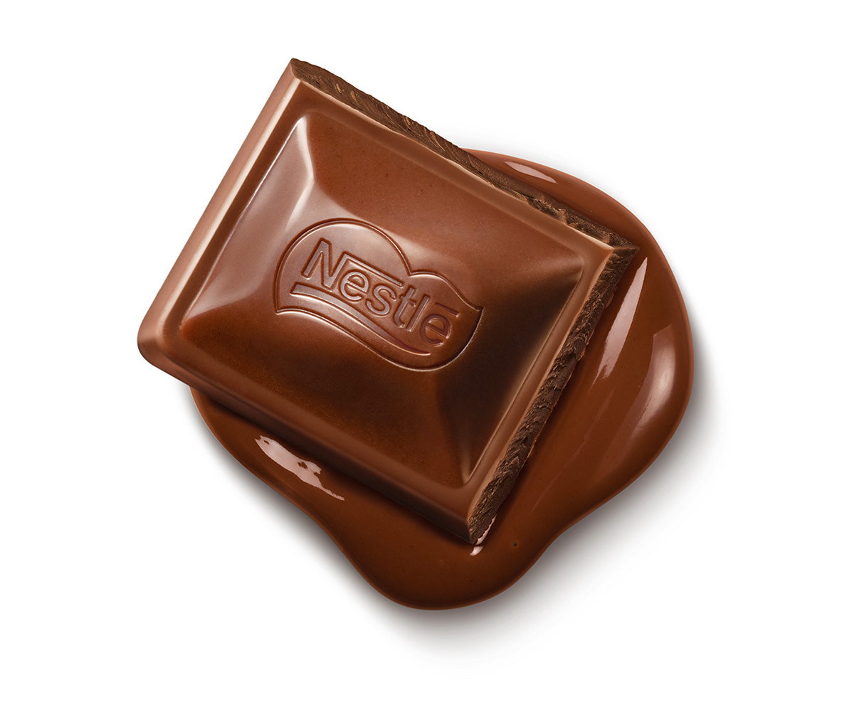 Super realistic photo illustrations of Nestlé chocolate bars of dark, milk and white chocolate.