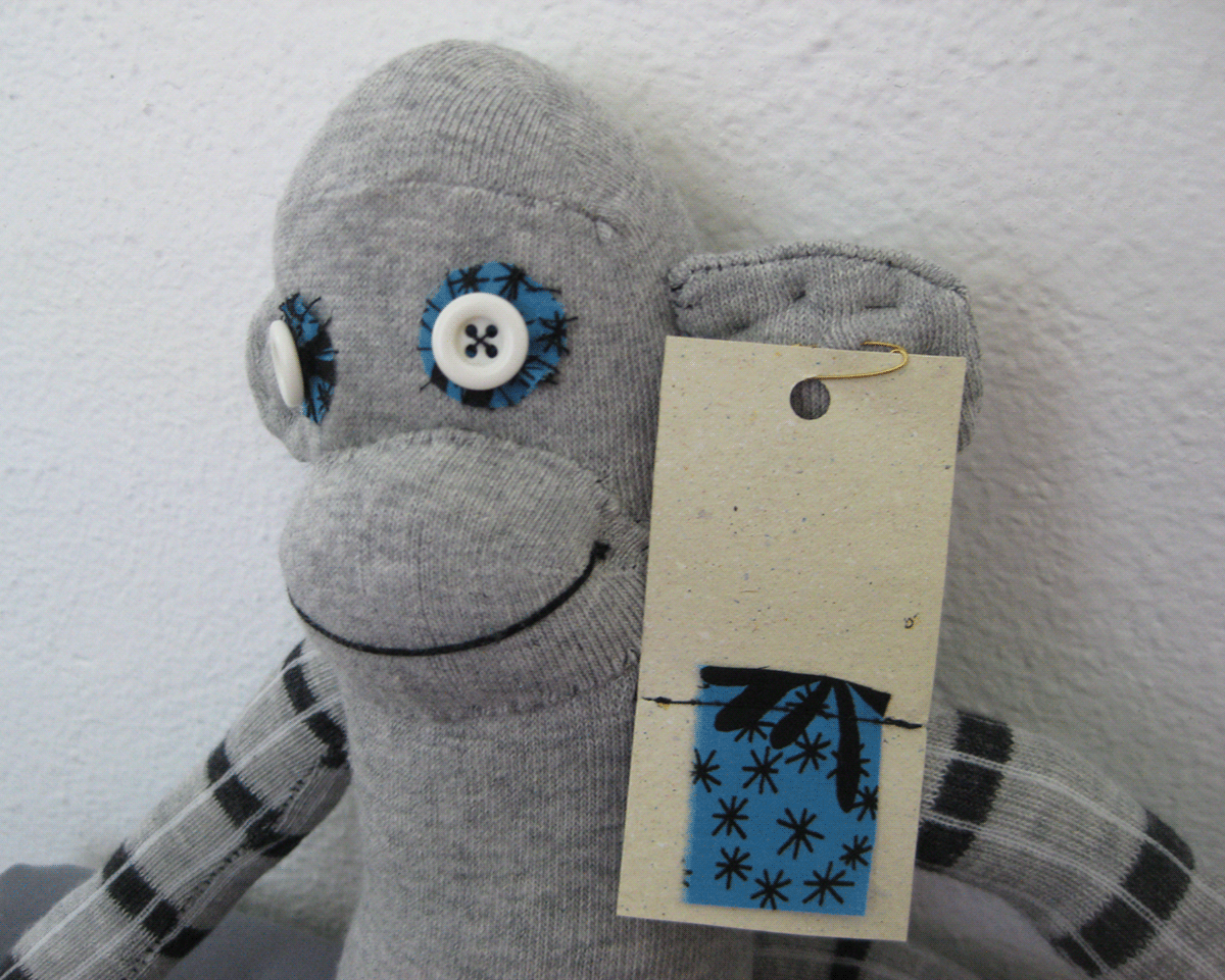 toy sock monkey design buttons  fabric stripes sewing  handmade  art and craft
