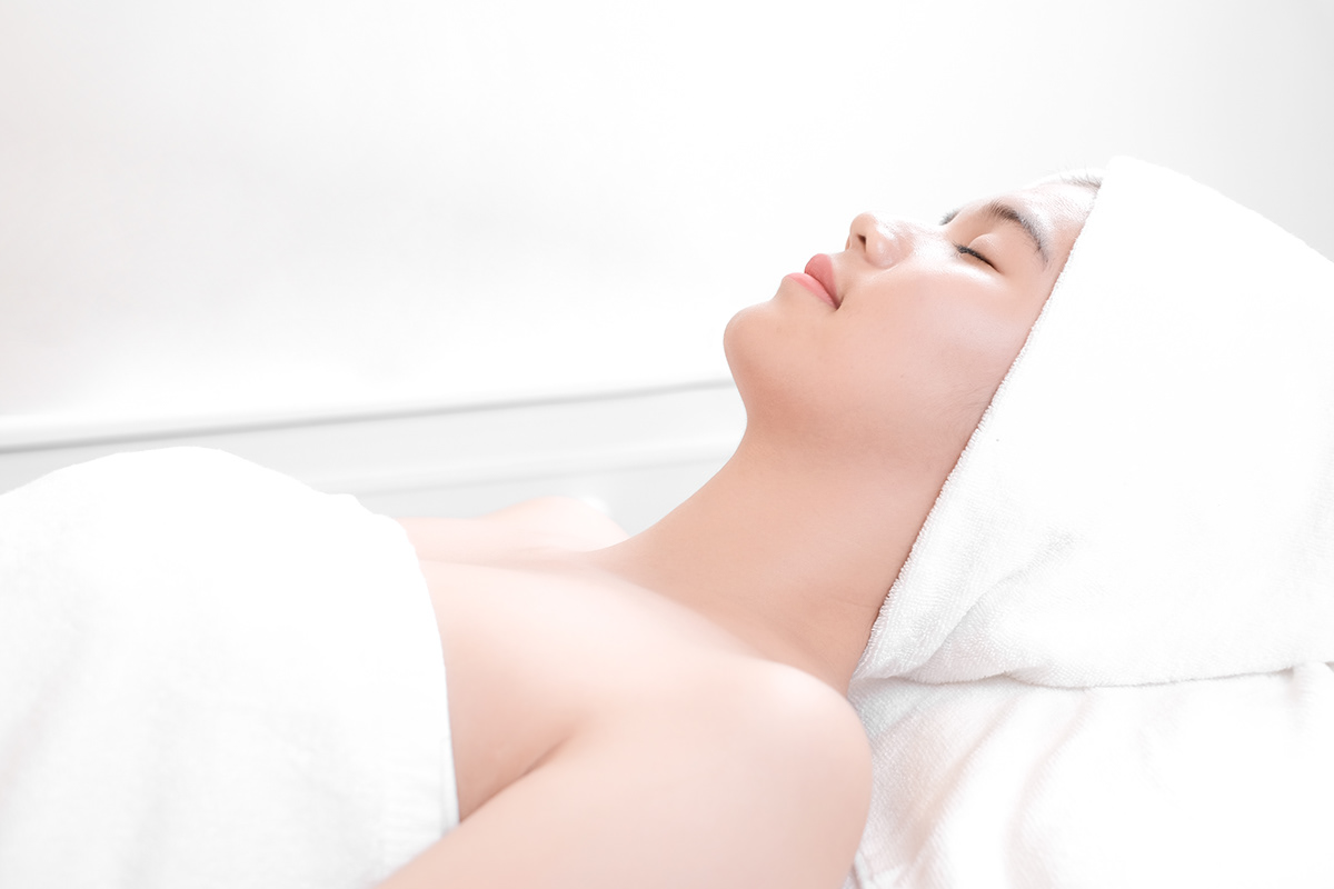 Spa ad massage facial skin natural asian model beauty makeup