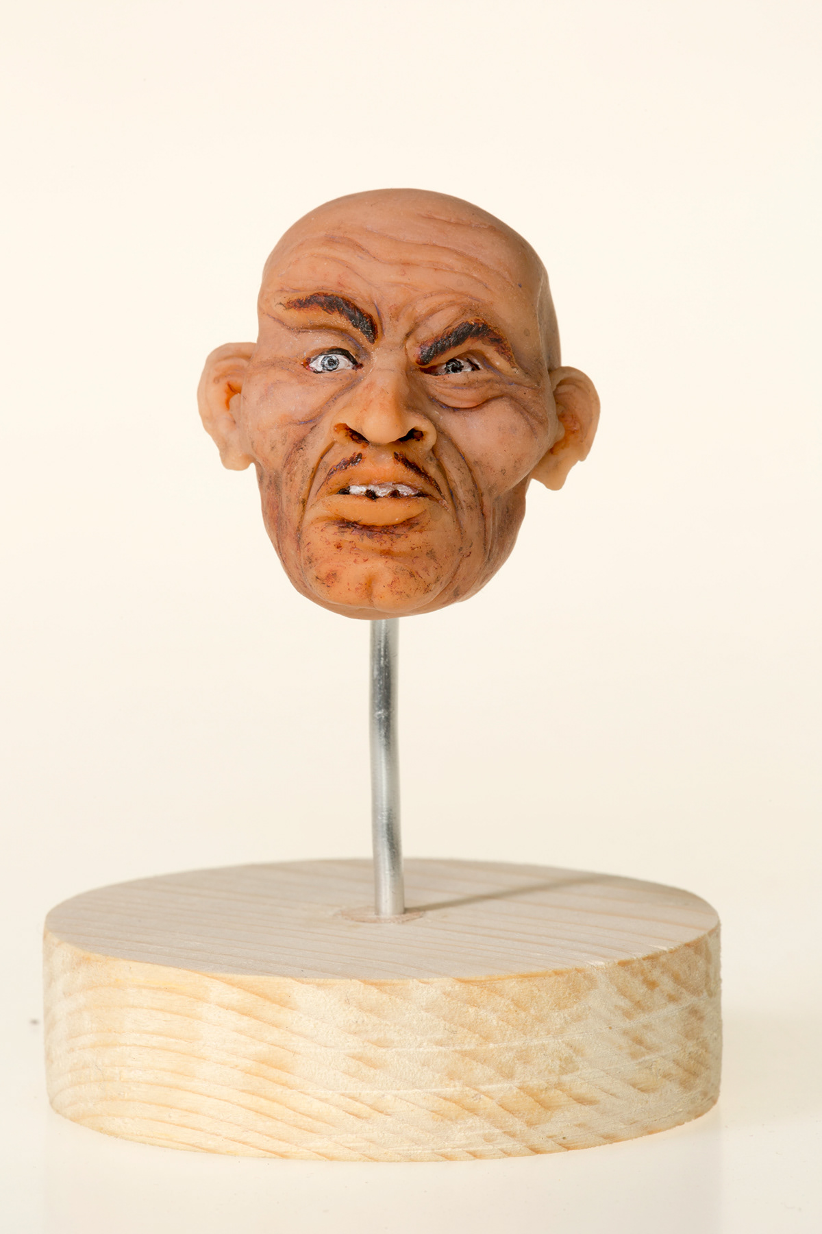 Miniature head sculpture sculpey
