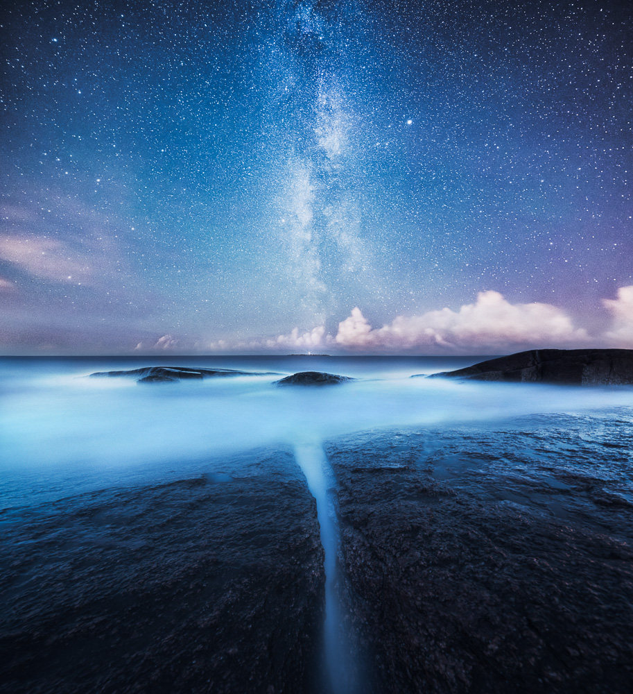 night astrophotography fine art photograph mikko lagerstedt milky way stars boat Shipwreck drifting Dreaming alone figure Silhouette beach