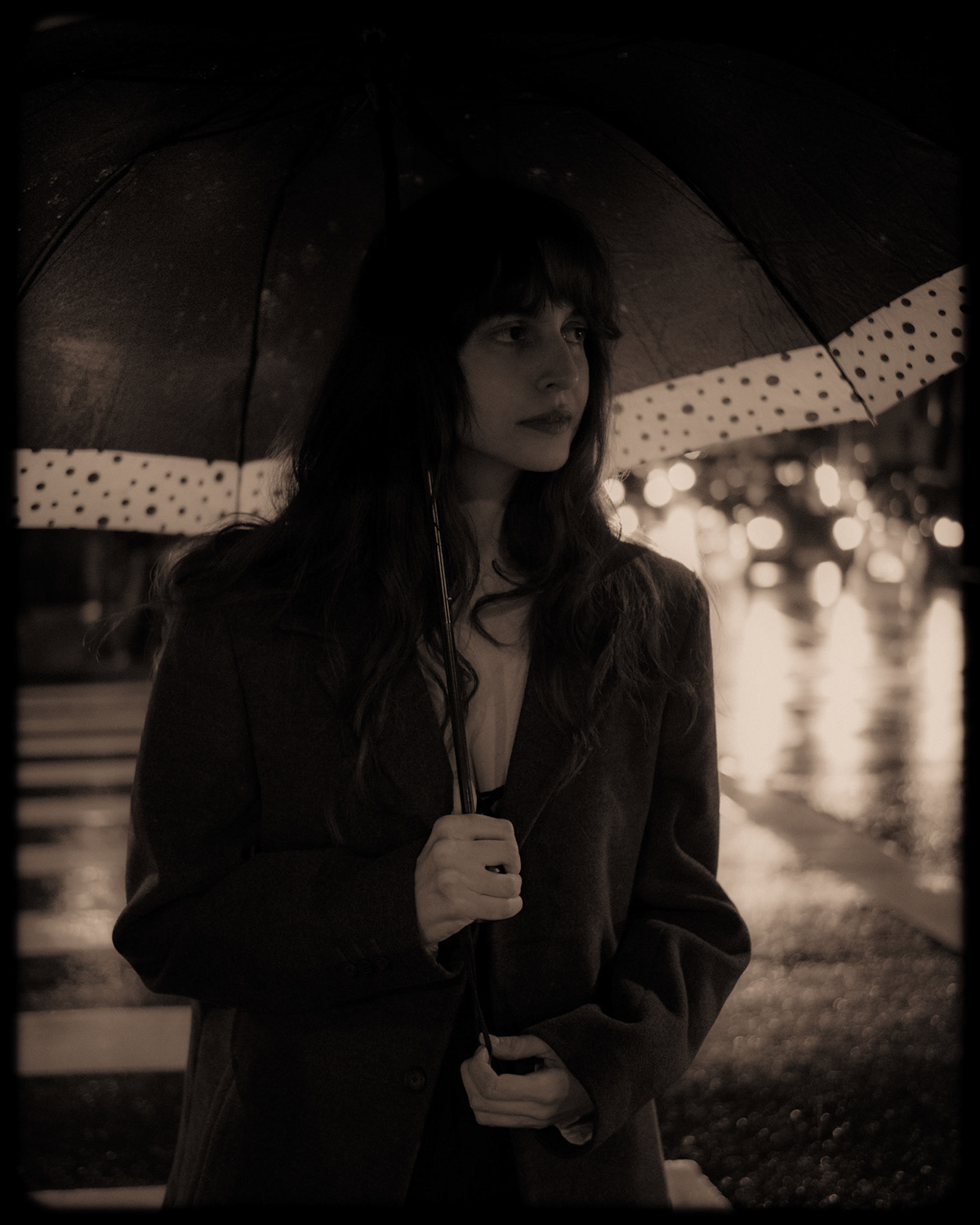 street photography Urban portrait woman rainy day