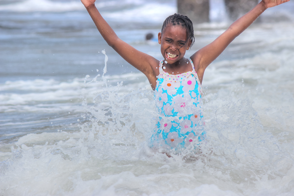 kids playing Ocean happy Fun girl ocean boy water africa