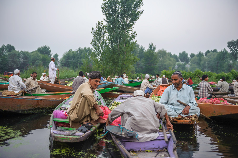 Kashmir market vegetables Boats boating floating market trading place water lake Dal Lake