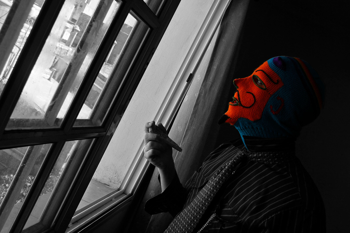 conquistador mask bolivia Carnaval Office Work  alienation colonialism job story