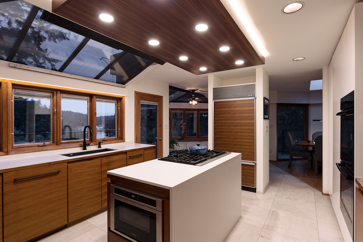 interior design  walnut modern minimal kitchen fireplace Cat wood logs