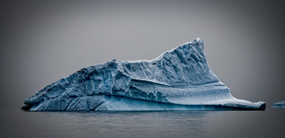 antarctica iceberg color Ocean mountains cold climate melting environment Landscape