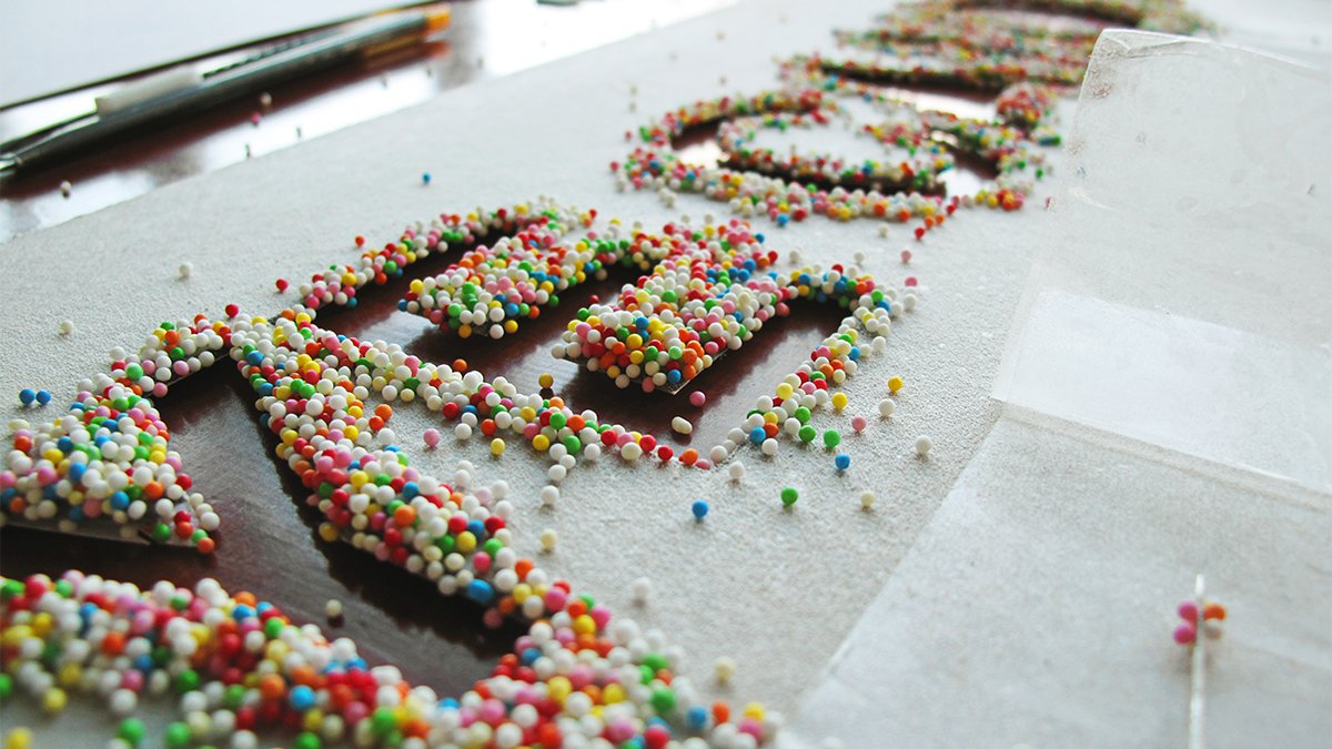 sweet colors eye font handmade experiment laser cut helvetica Candy rainbow color letters lettering hundreds and thousands dots