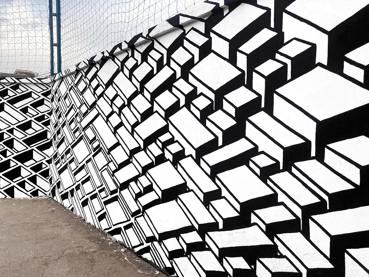 Black and white abstract geometric mural in Pompei, Italy by Stillo Noir