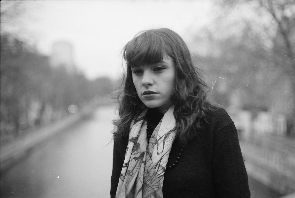 Paris Street clothes French parisian woman portrait black White analog rain winter scarf cold