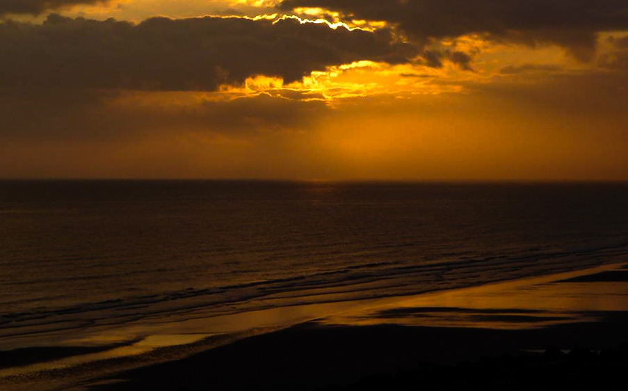 sunset wales bournmouth Sunrise sea reflection Sun rays water beach