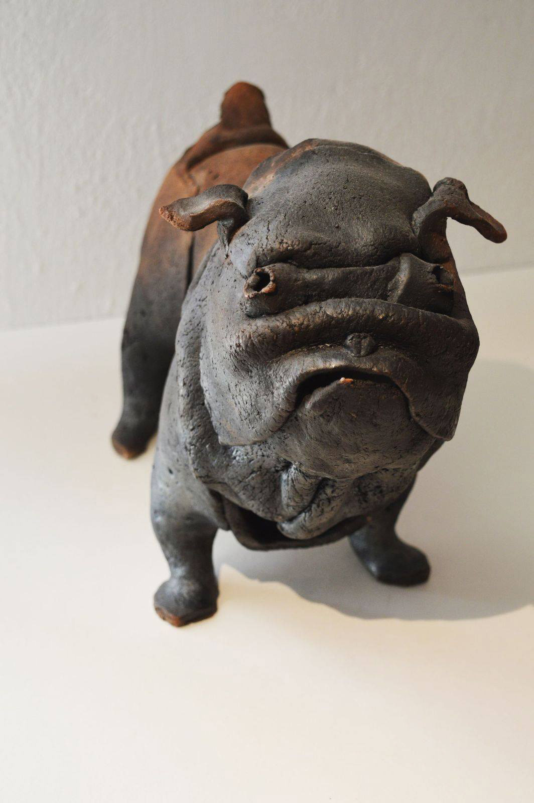 Racu fired ceramic dog sculpture
