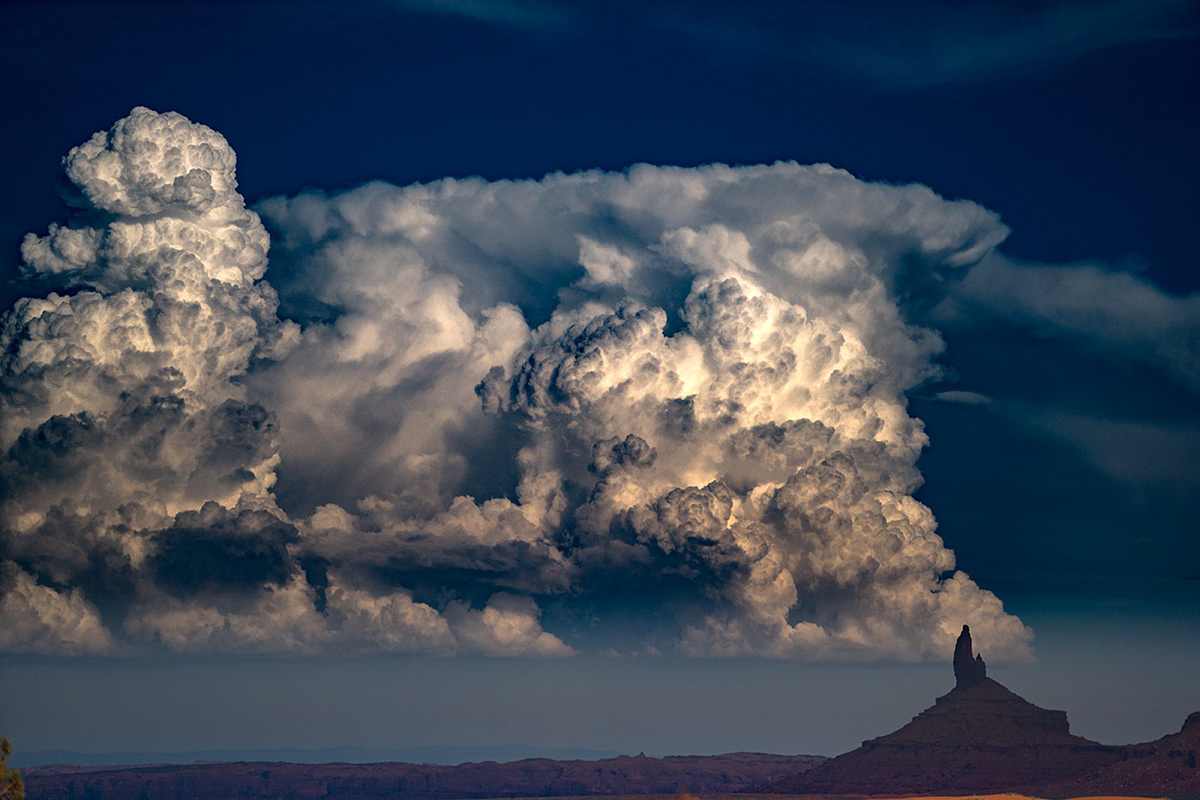 cumulus cloud build up in monument valley national park, utah landscape, america