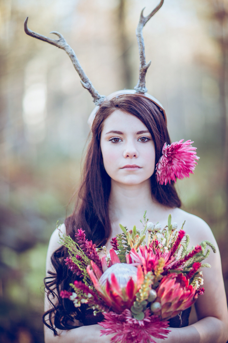 Flowers antlers girl woods portrait