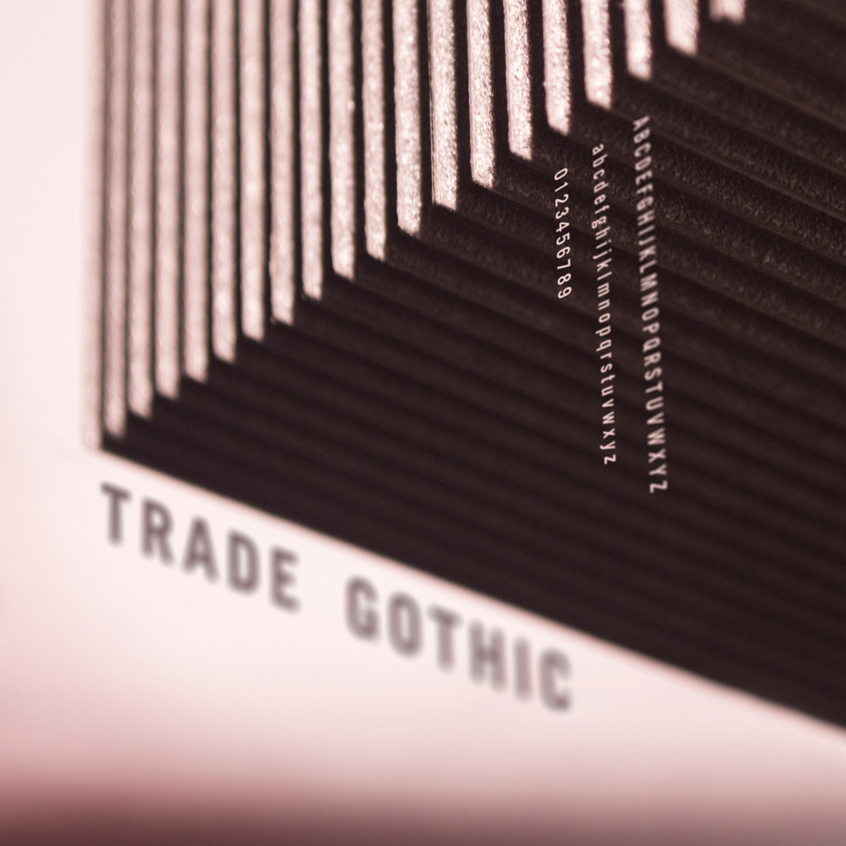 photo trade gothic poster type specimen Triptych laser