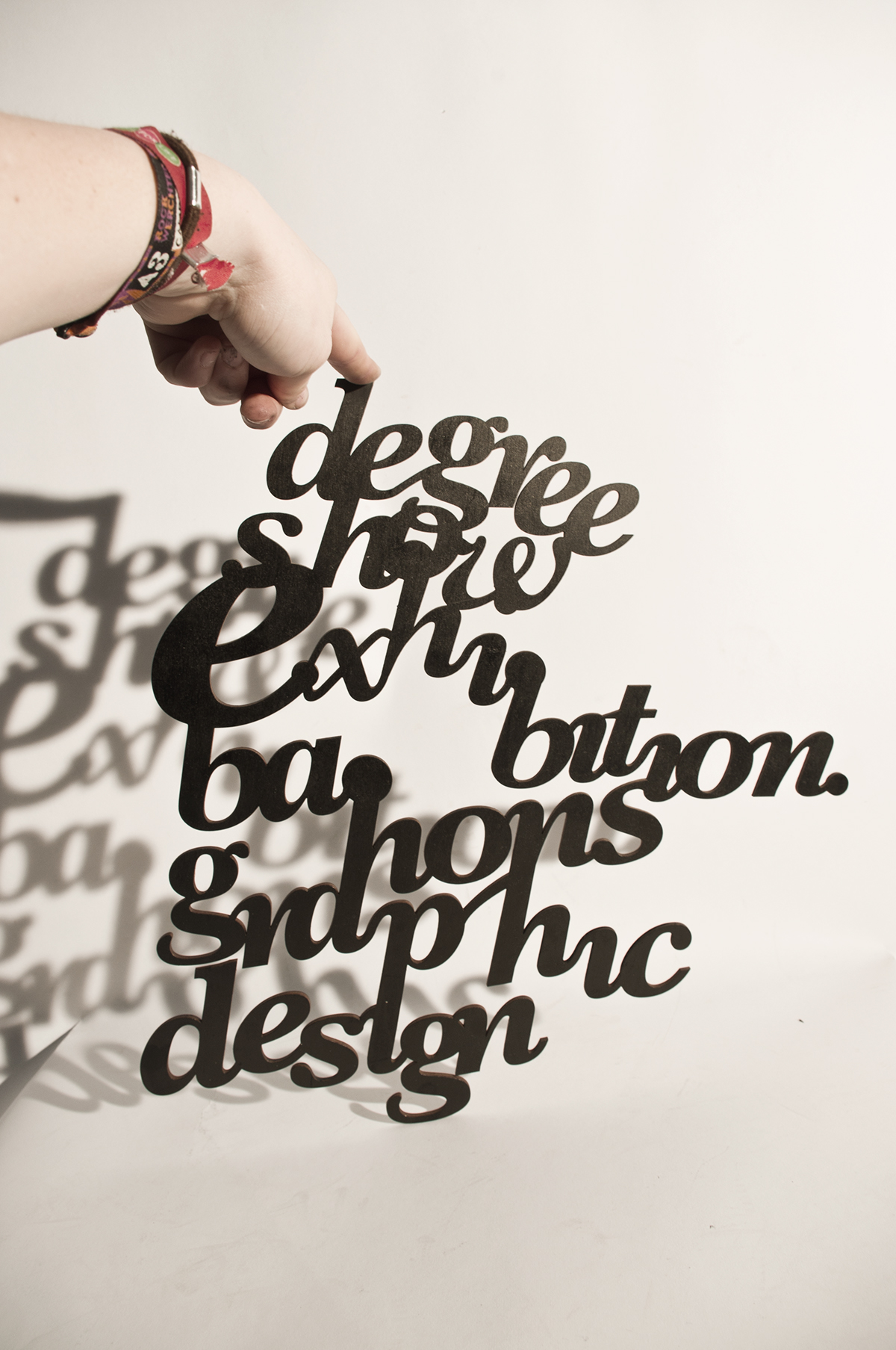 contrast Exhibition  design photo shadow laser cut wood poster Show type typography  