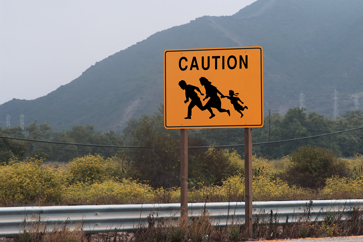 colombia miami sign Immigration usa border installation  silhouette wood immigrants highway  perception  graphic design