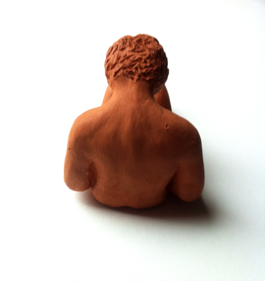 small sculpture red clay