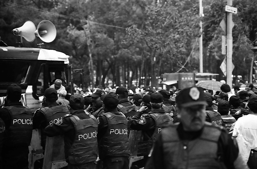 black and white mexico city people city police