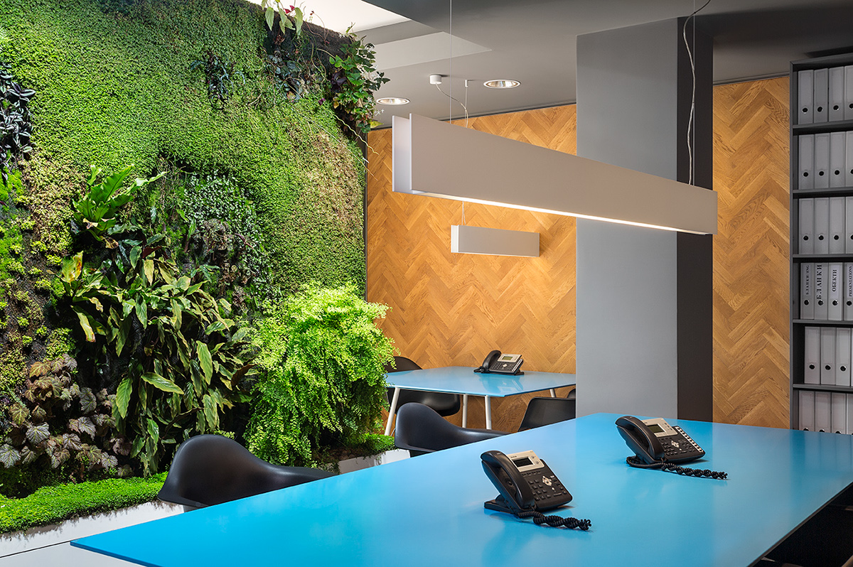 Office real estate agency Interior green wall green wall living Flowers parquet furniture table carpet