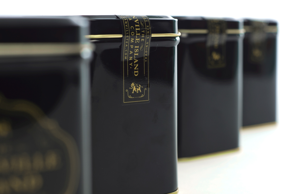 Teashop package tea tins black and gold heritage brand rebranding market brands