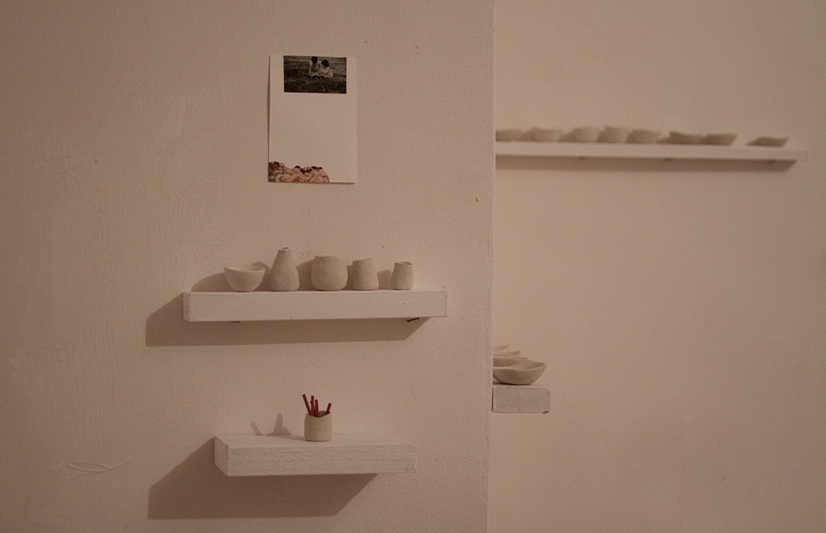 female Gender feminism installation clay angels Pots bowls sacrifice kitchen domestic