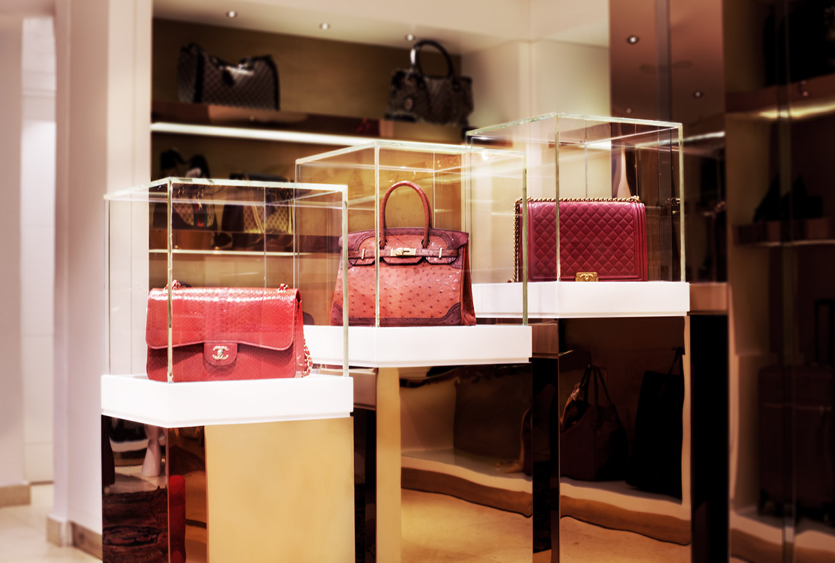 interiors decor gold gilded Retail brochure Midas luxury accessories gucci Salvatore Ferragamo jimmy choo Dolce & Gabbana
