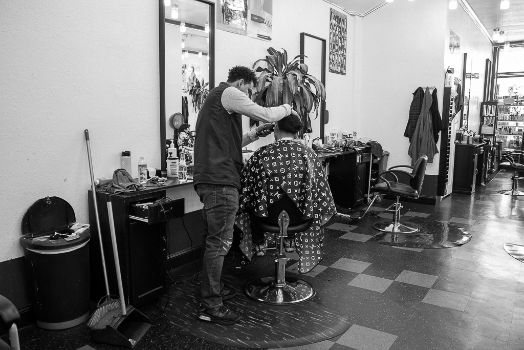 barber barbershop black and white illegal immigration Inmigrants nicaragua photo story