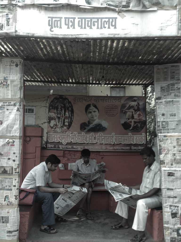 Newspaper reading in MUMBAI