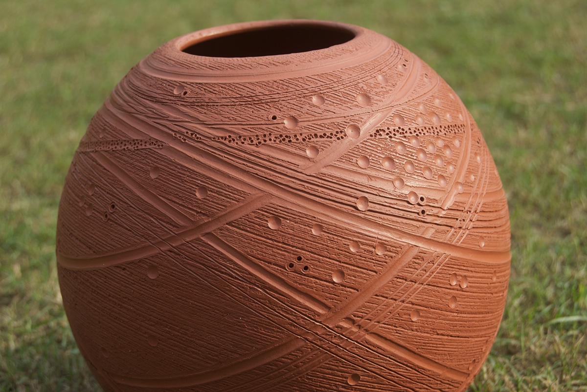 terracotta pot surface ornamentation cosmos Musical Instrument Pottery ceramics  design clay