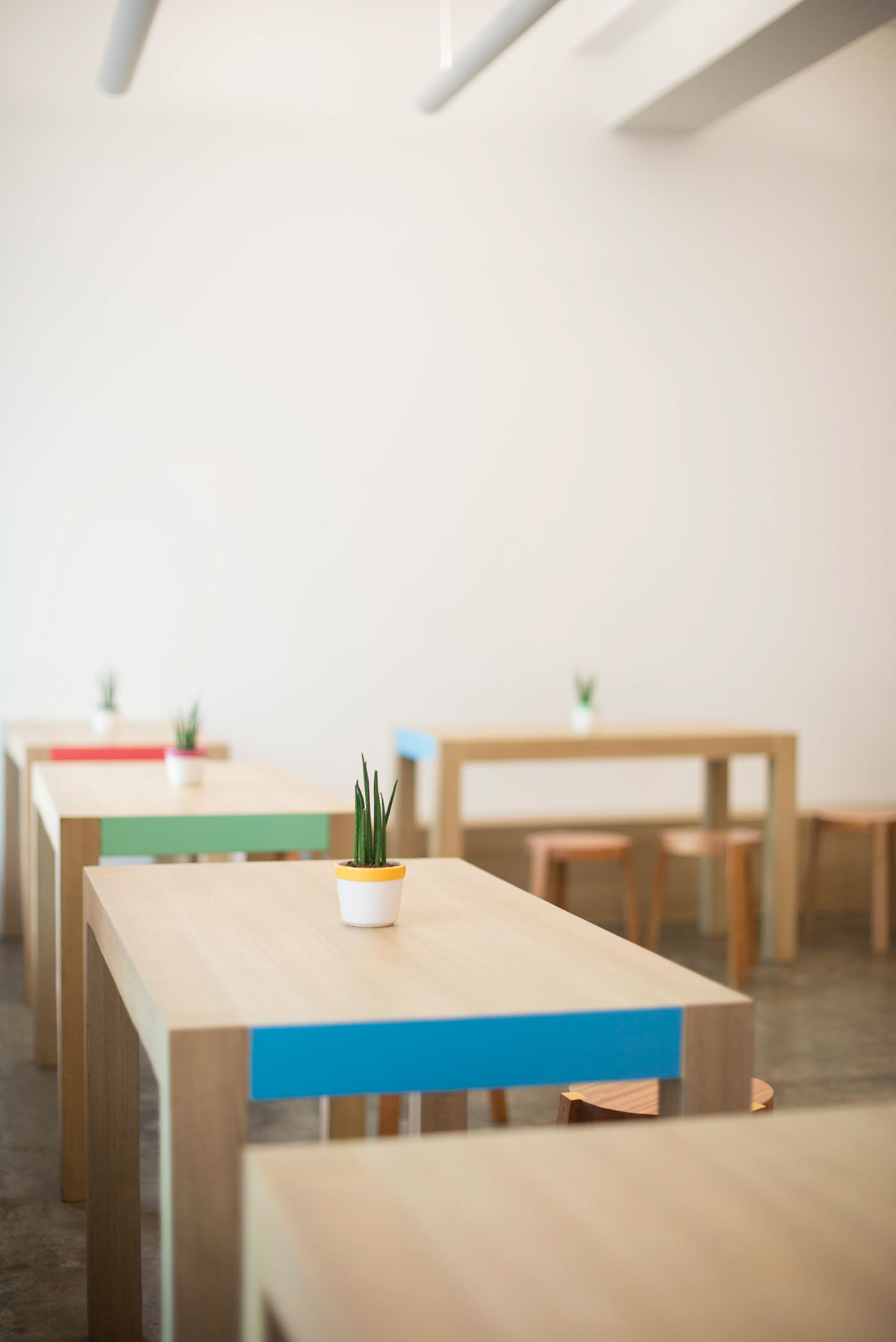 Coffee colours colors Manila philippines cafe Playful happy Workshop simple clean wood stools menu furniture