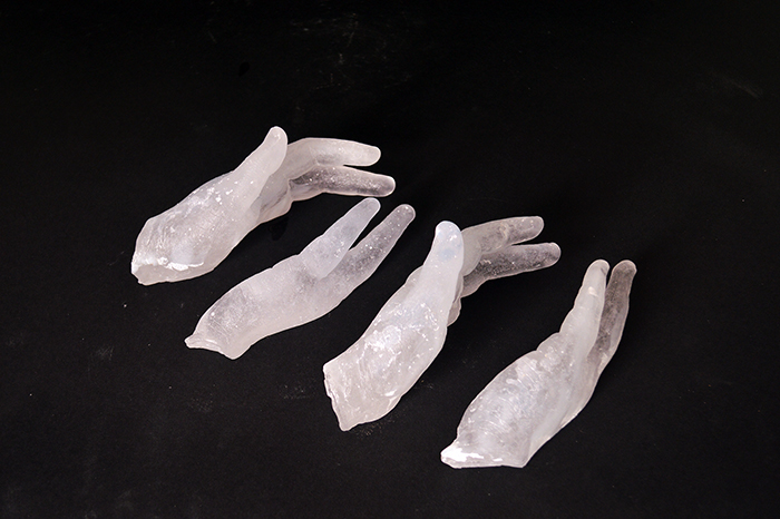 glass body hand casting distortion fingers
