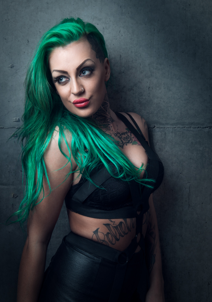 alt model Alternative model tattoos inked green hair female one light Moody beauty Pout