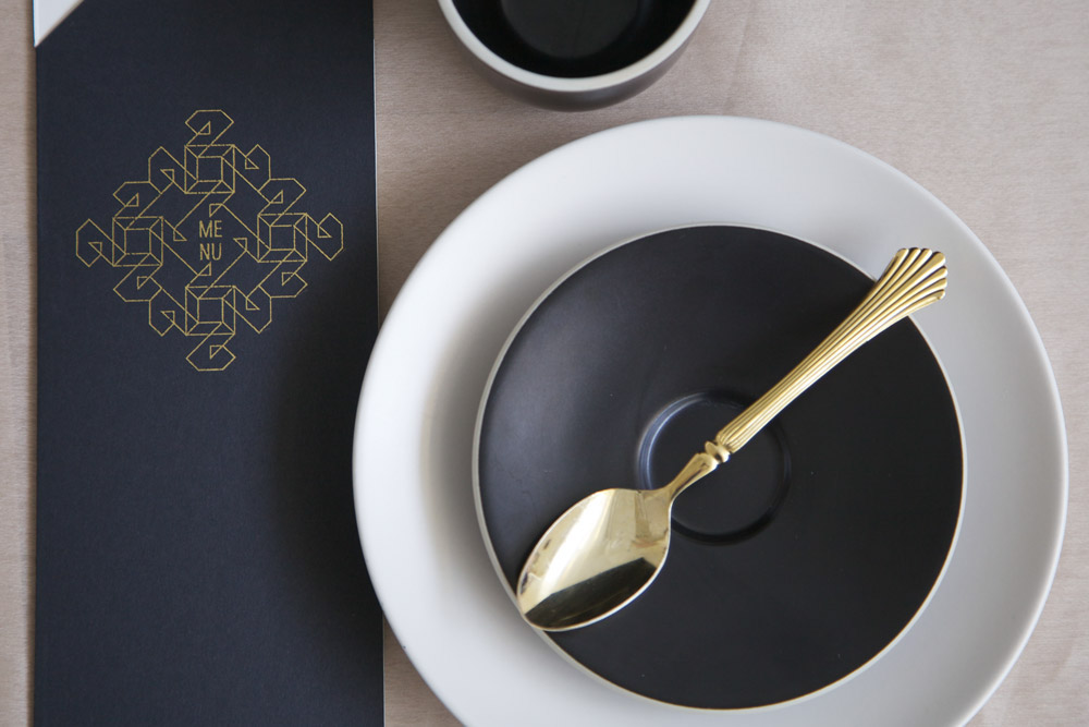 restaurant desserts art deco 1920s table setting elegant opulent roaring twenties gilded gilded spoon spoon gold black Earnest contemporary