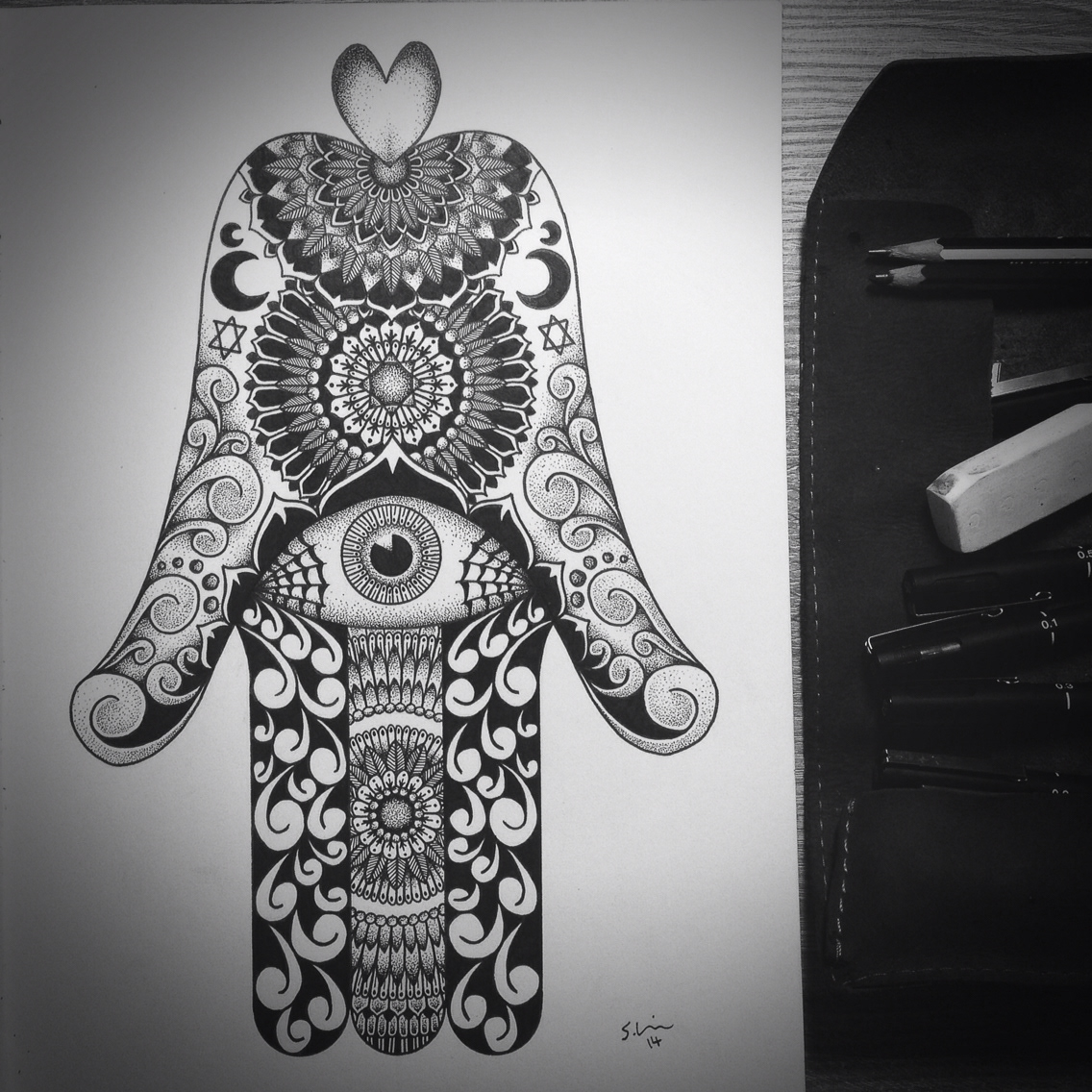 Hamsa hand tattoo design black and white