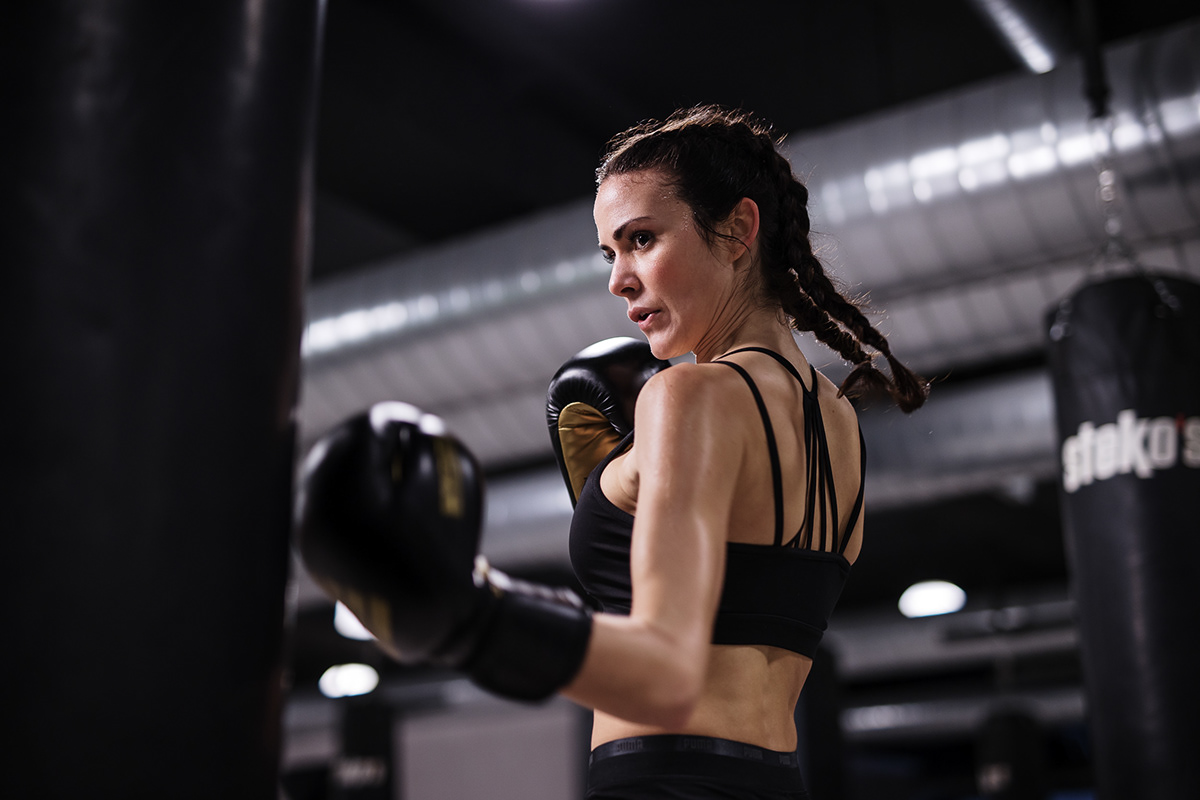 Boxing girl hook power punch ring uppercut Woman Power workout