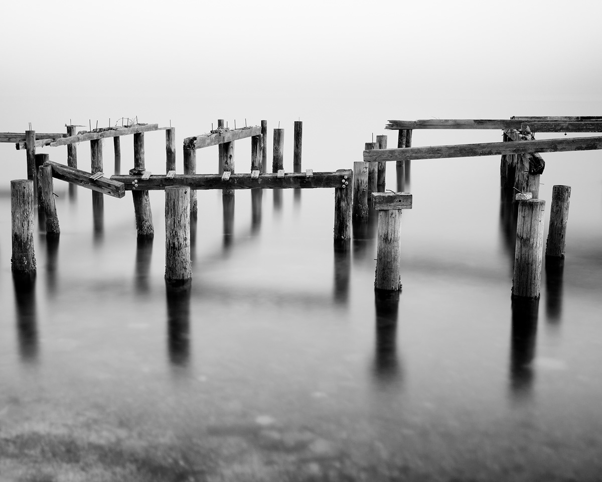 Washington pacific northwest black and white Puget Sound long exposure water monochrome tacoma pilings decay