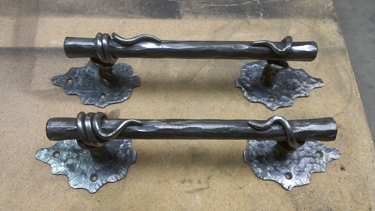forged iron blacksmithing handcrafted Metal art old world door handles door pulls