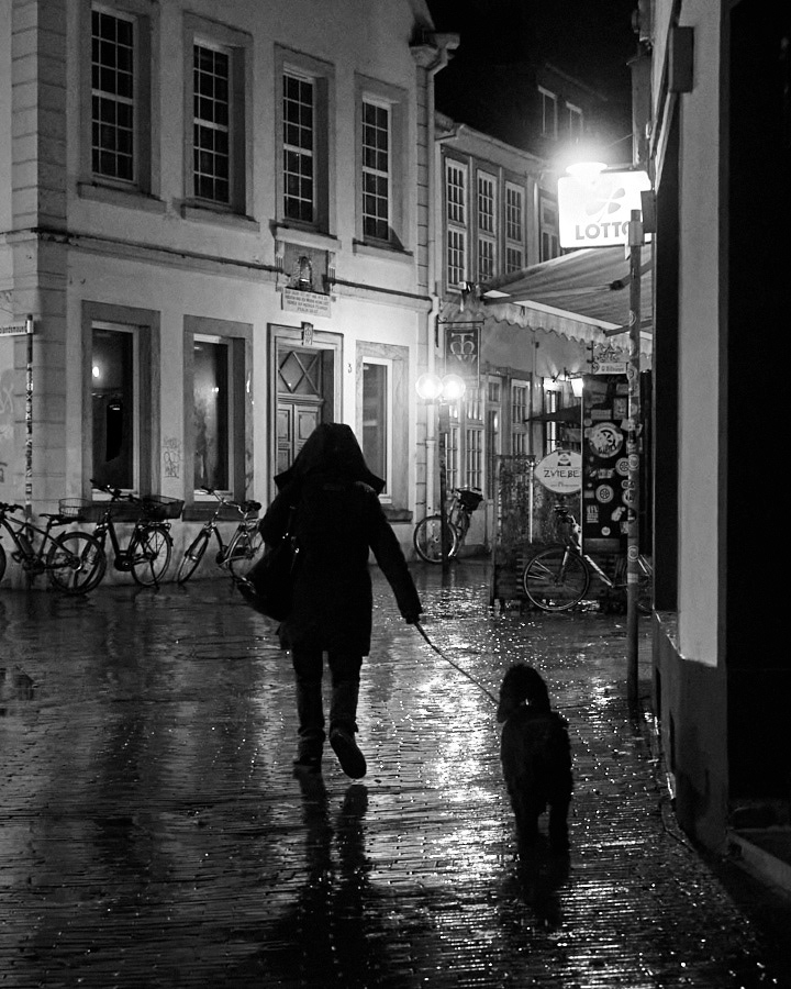 black and white street photography Urban rain light night Street dark people