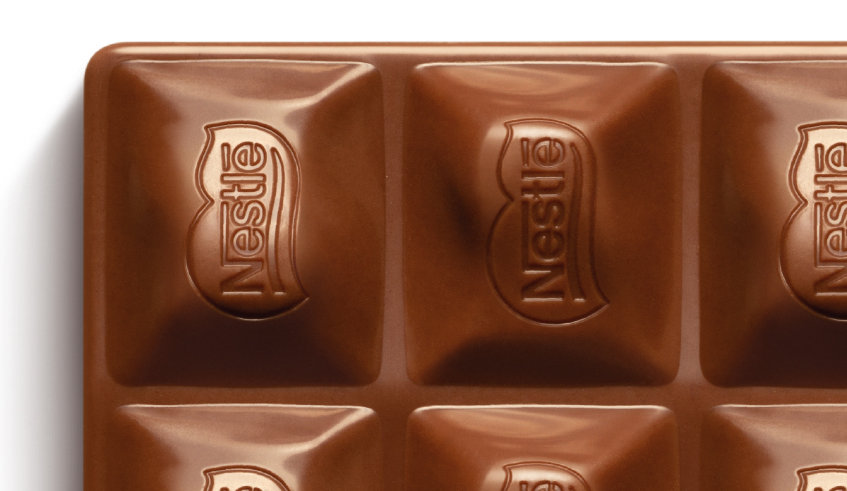 Super realistic photo illustrations of Nestlé chocolate bars of dark, milk and white chocolate.