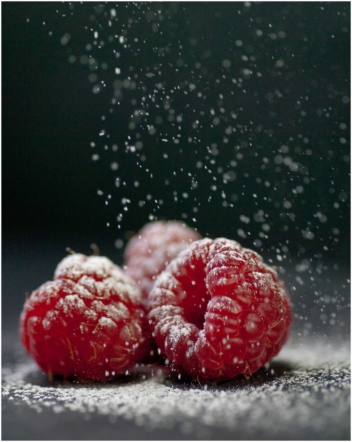 Food  pomegranate raspberry raspberries spoon icing sugar seeds