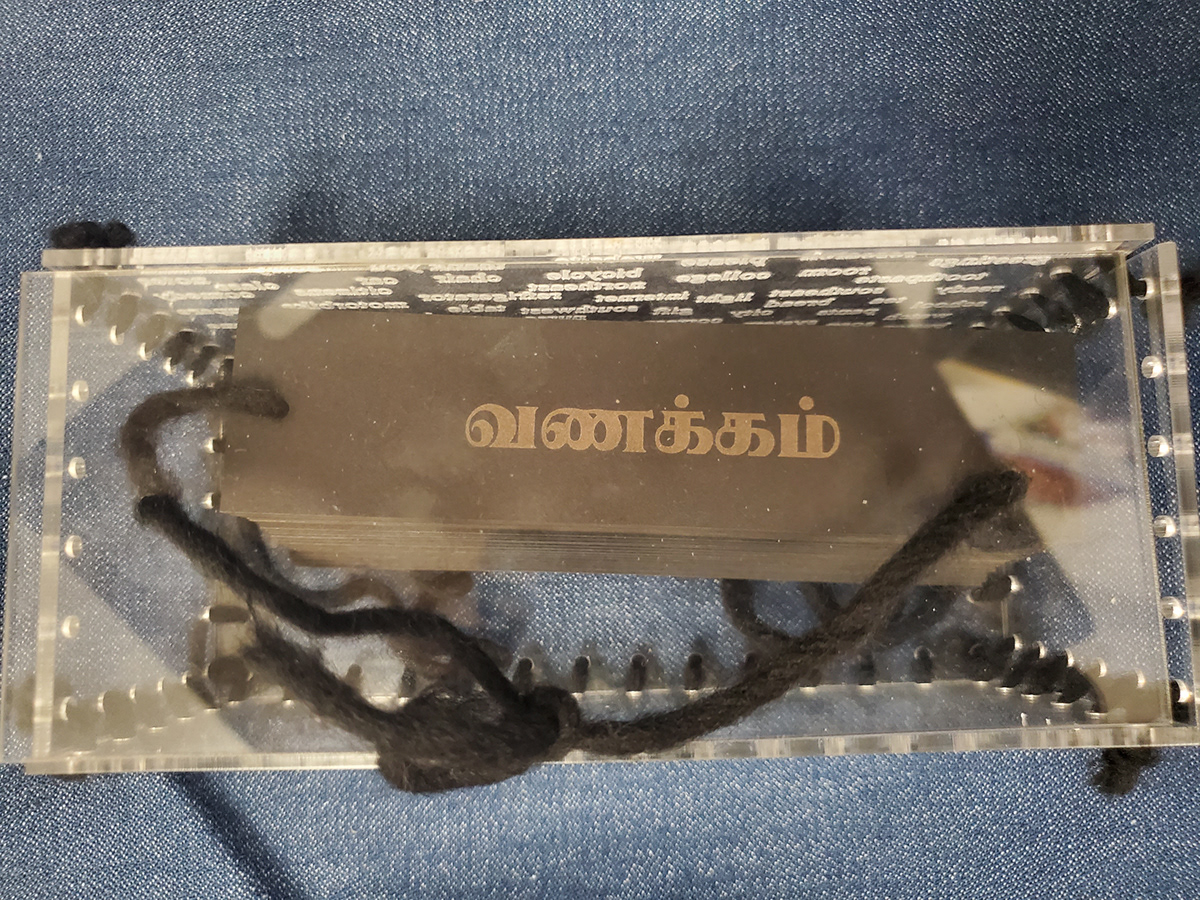 binding black book Book Arts engraved language laser cut tamil transparent words