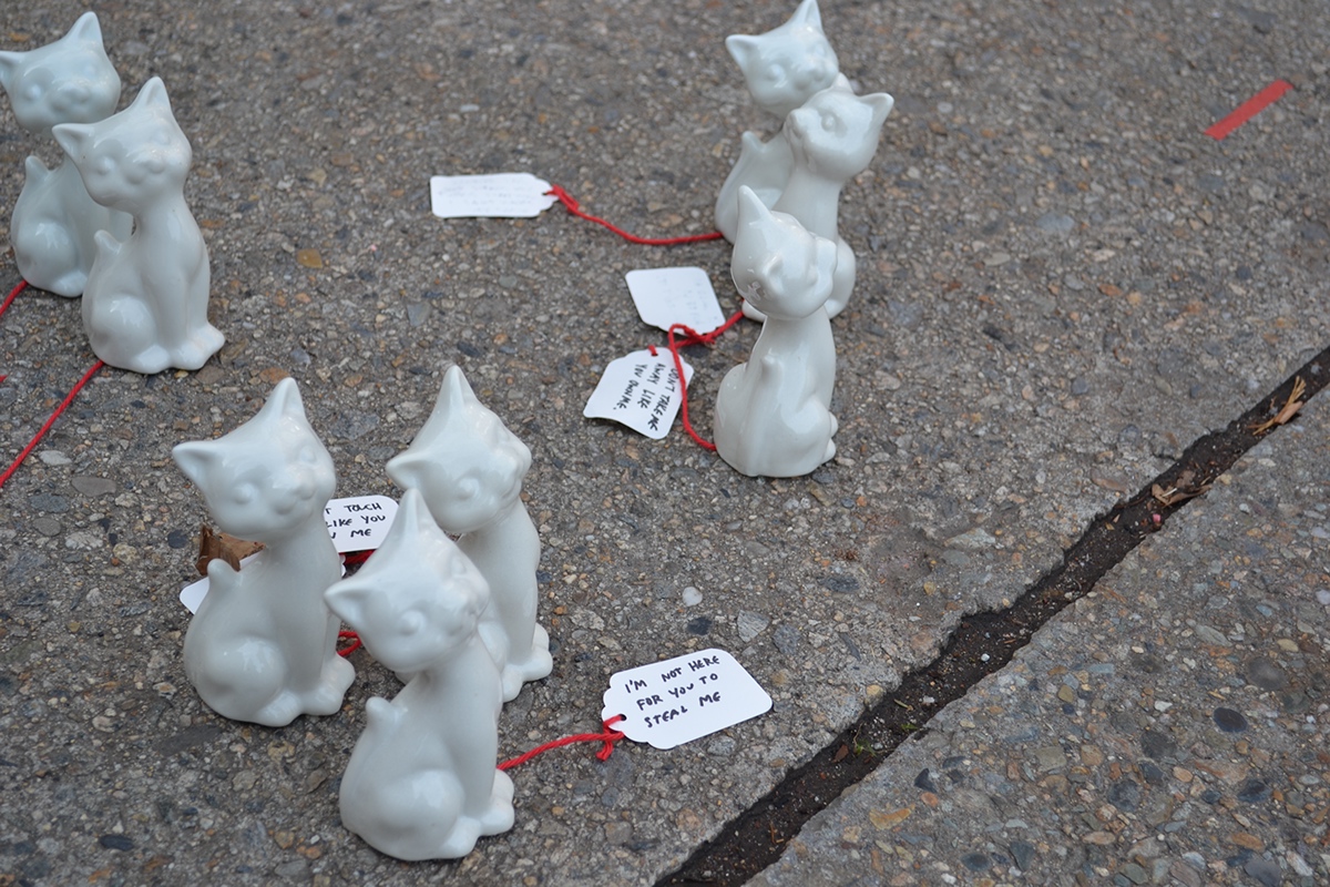 Dont steal me social commentary porcelain Slip Cast Ceramics ceramics  Sara K Dunn date rape kitsch cats commentary public installation