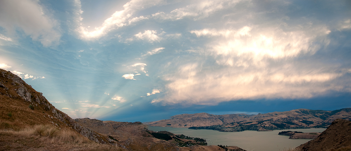 sunset light clouds hills Christchurch New Zealand
