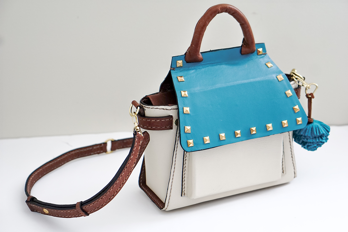 Adobe Portfolio accessory design handbag backpack convertible Rivet hand stitch leather