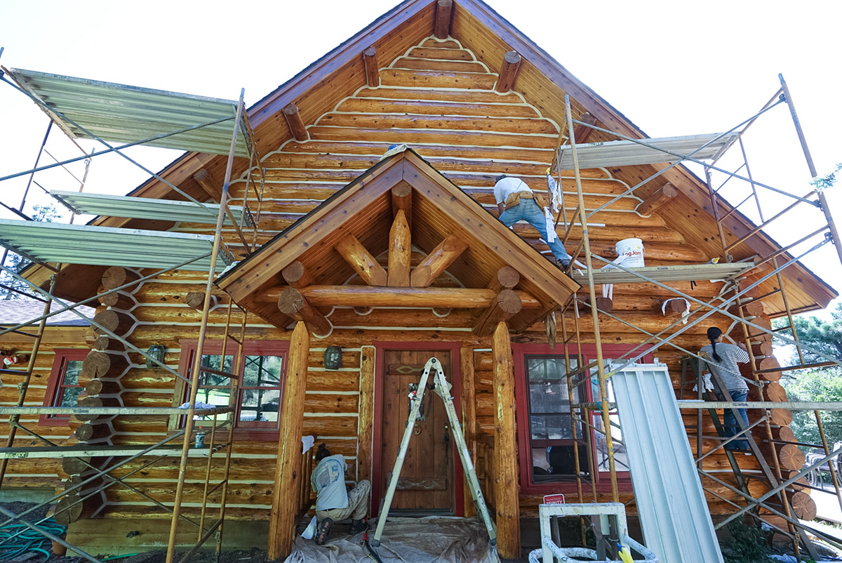 Log Home cabin chinking staining Colorado Log Home Maintenance Log Home Restoration log home repair