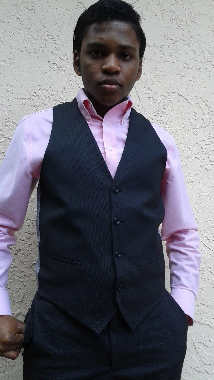 Madisson Ledan wearing a vest and pink shirt